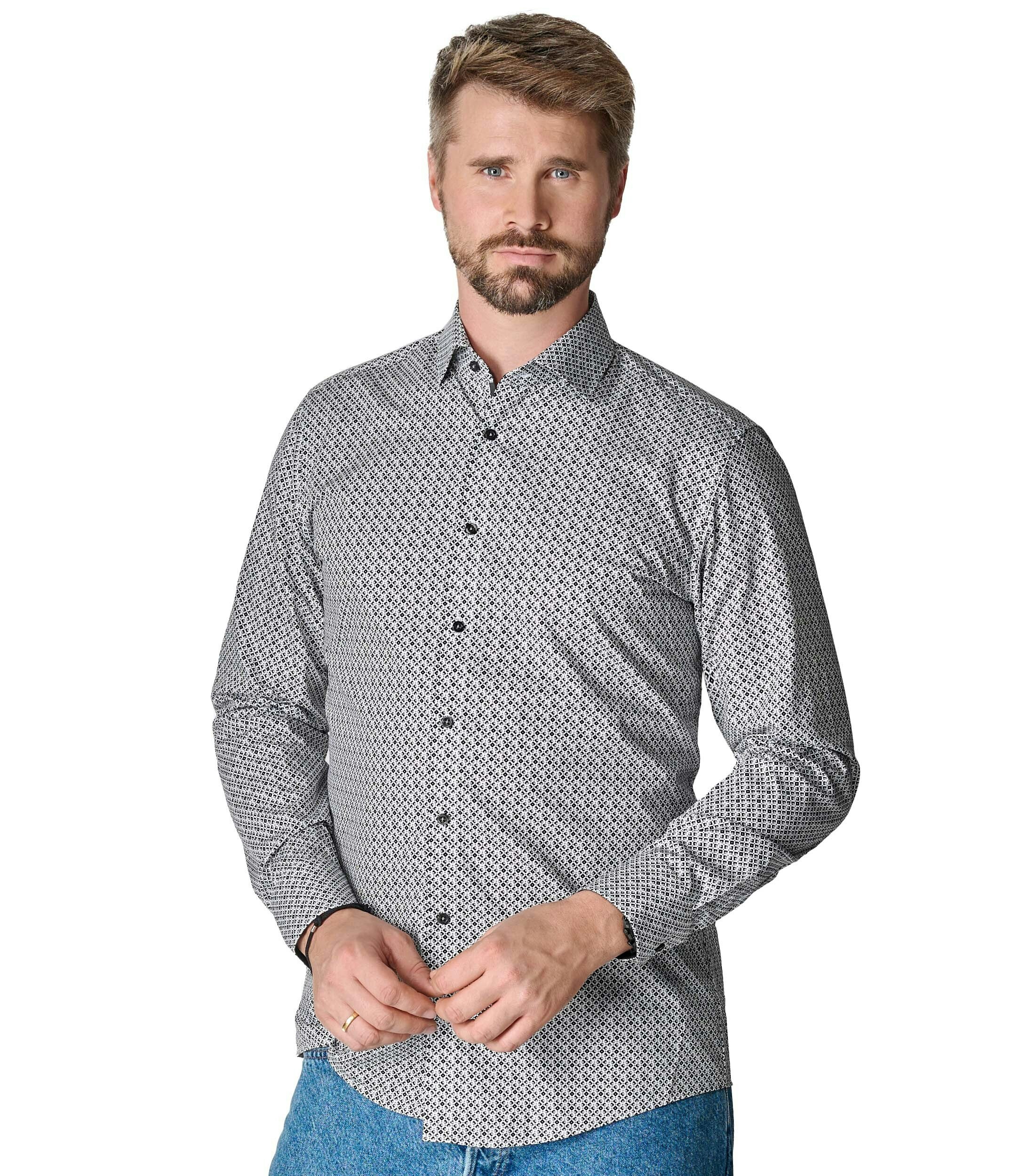 Das Model trägt ein Businesshemd im Print Muster in der Farbe Dunkelgrau