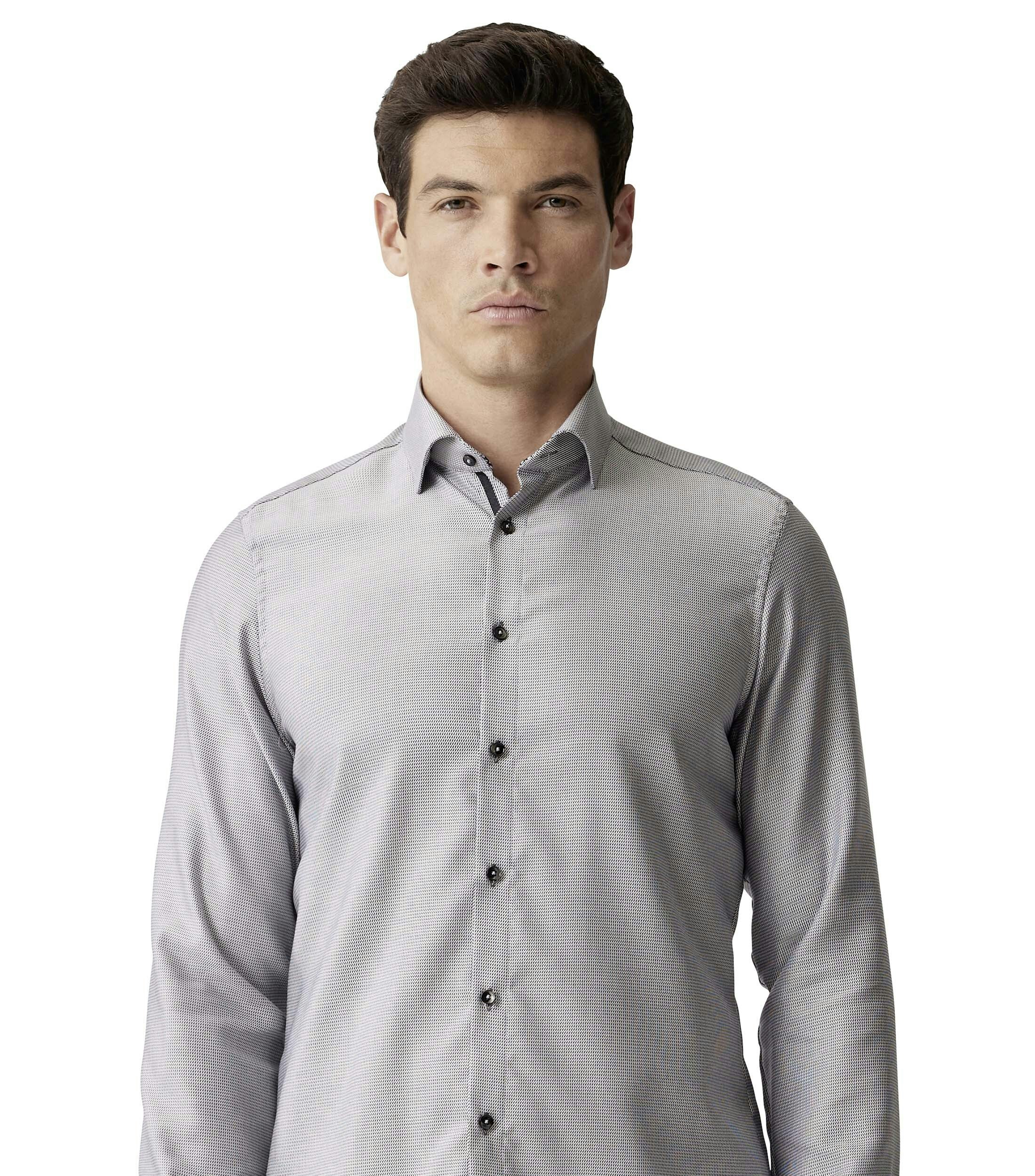 Ein Businesshemd im uni Muster in der Farbe Dunkelgrau