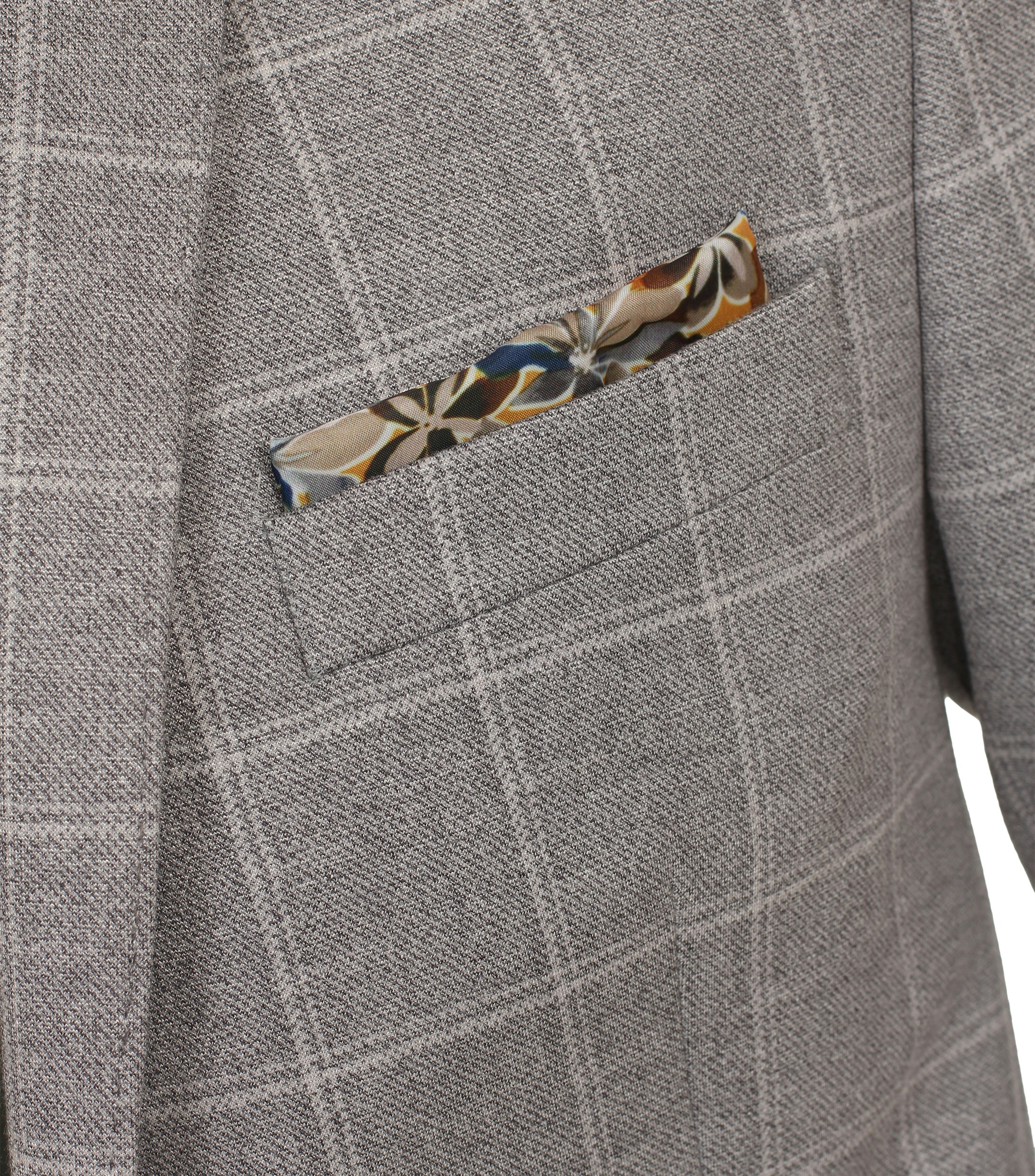 Ein Sakko im uni Muster in der Farbe Beige