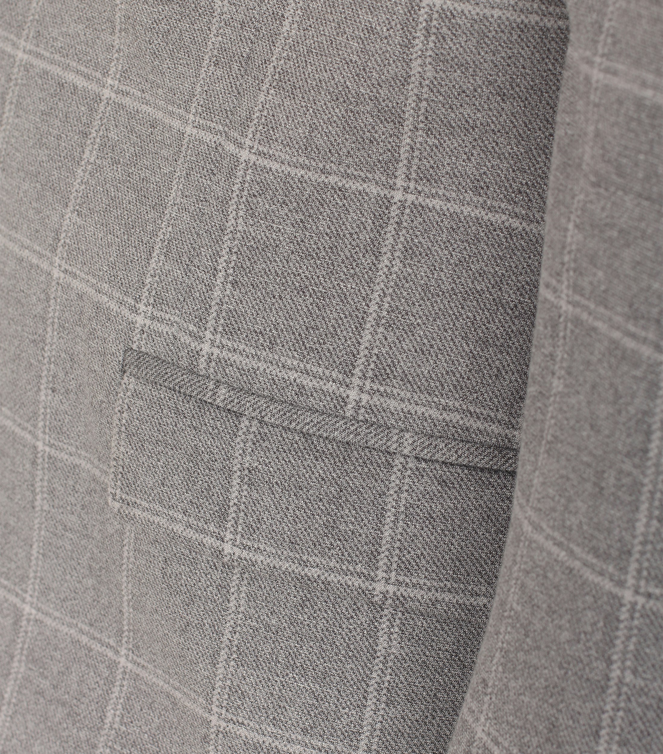 Ein Sakko im uni Muster in der Farbe Beige