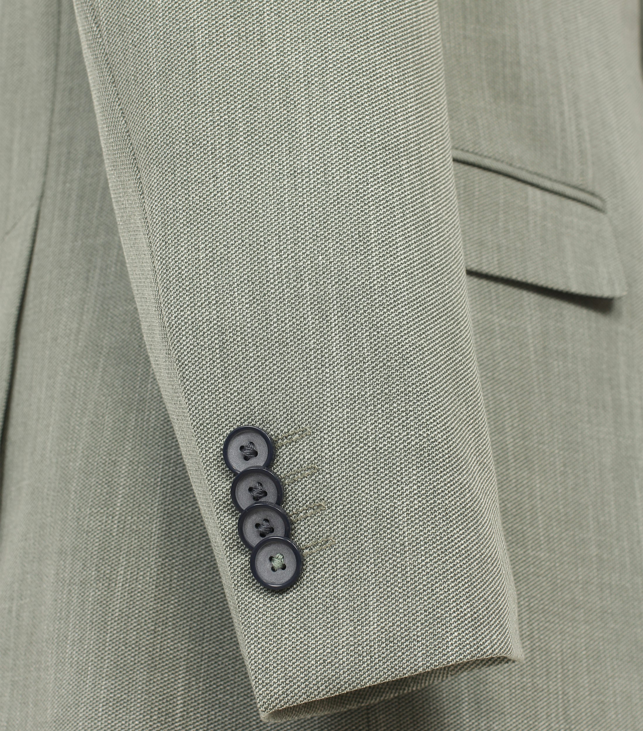 Ein Sakko im uni Muster in der Farbe Grün