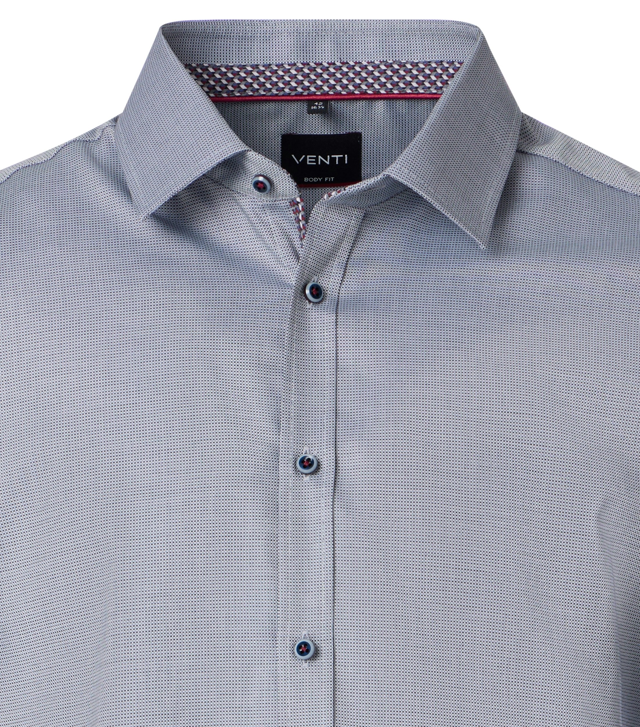 Ein Businesshemd im uni Muster in der Farbe Hellblau