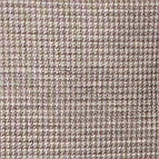Das Model trägt ein Sakko im uni Muster in der Farbe Beige