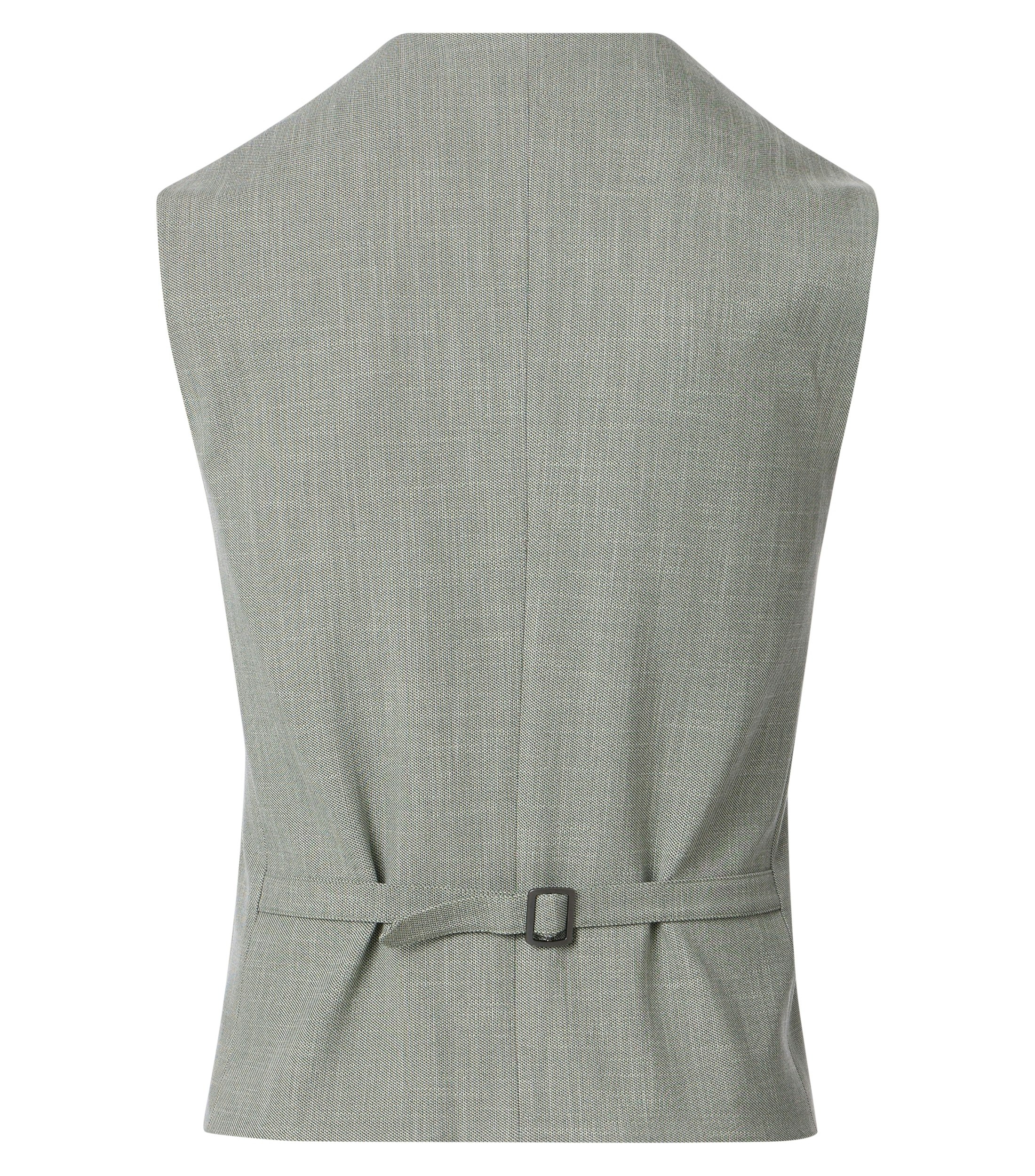 Ein Weste im uni Muster in der Farbe Grün