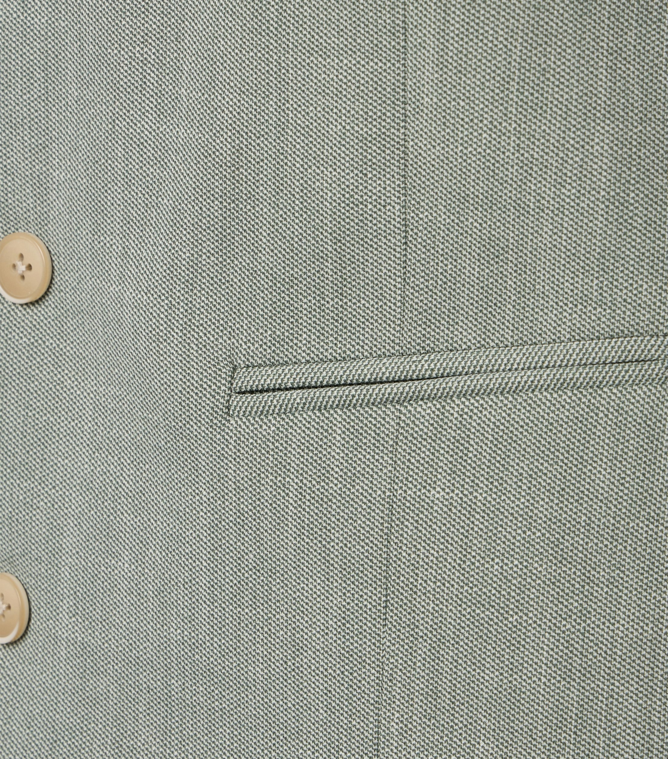 Ein Weste im uni Muster in der Farbe Grün