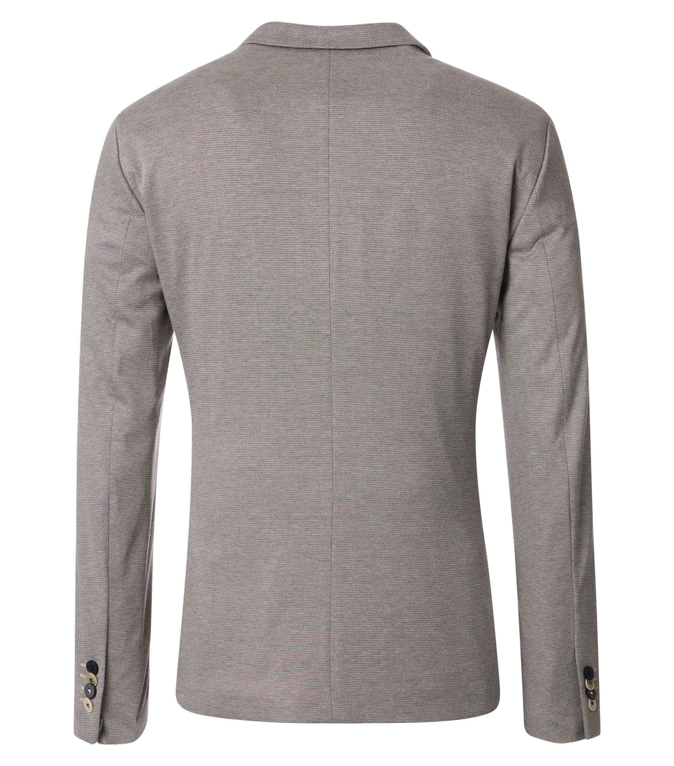 Ein Sakko im uni Muster in der Farbe Beige