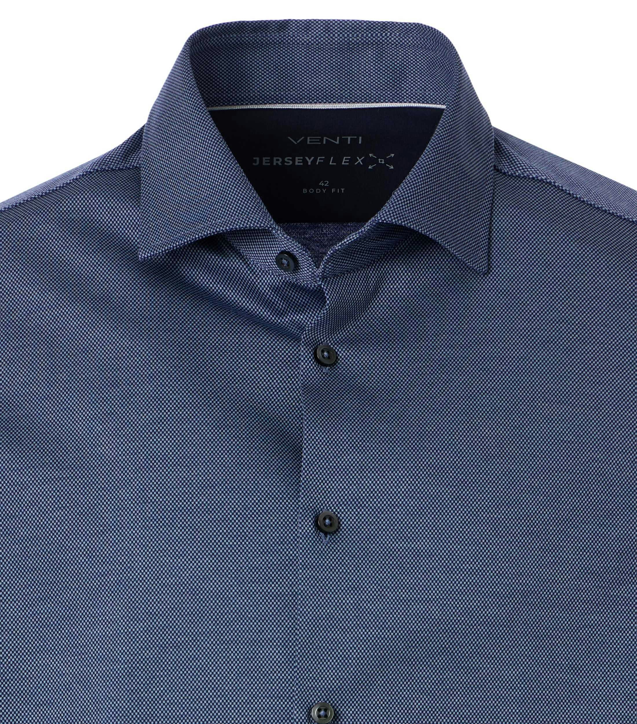 Ein Businesshemd im uni Muster in der Farbe Blau