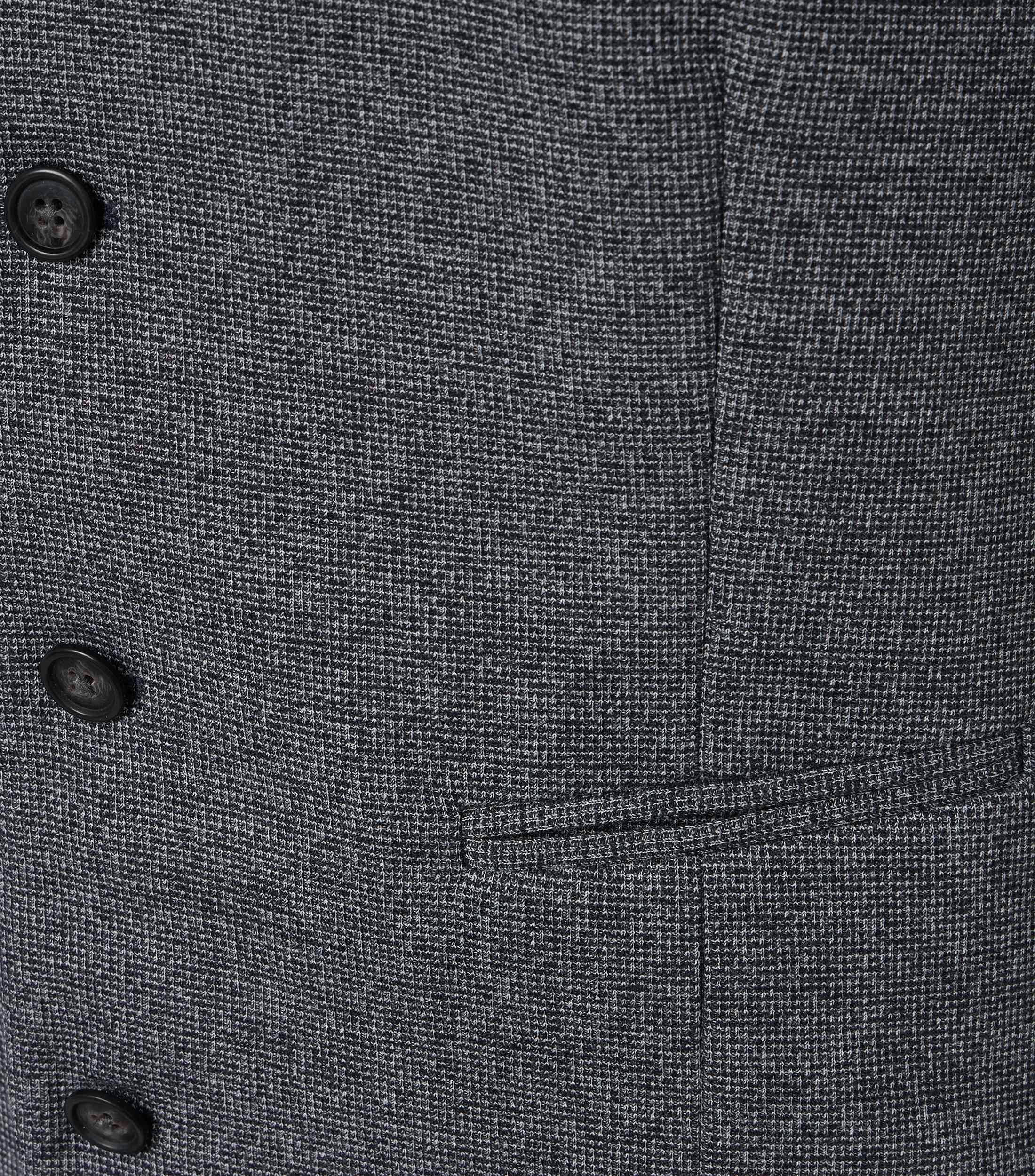 Eine Weste im uni Muster in der Farbe graues Mittelblau