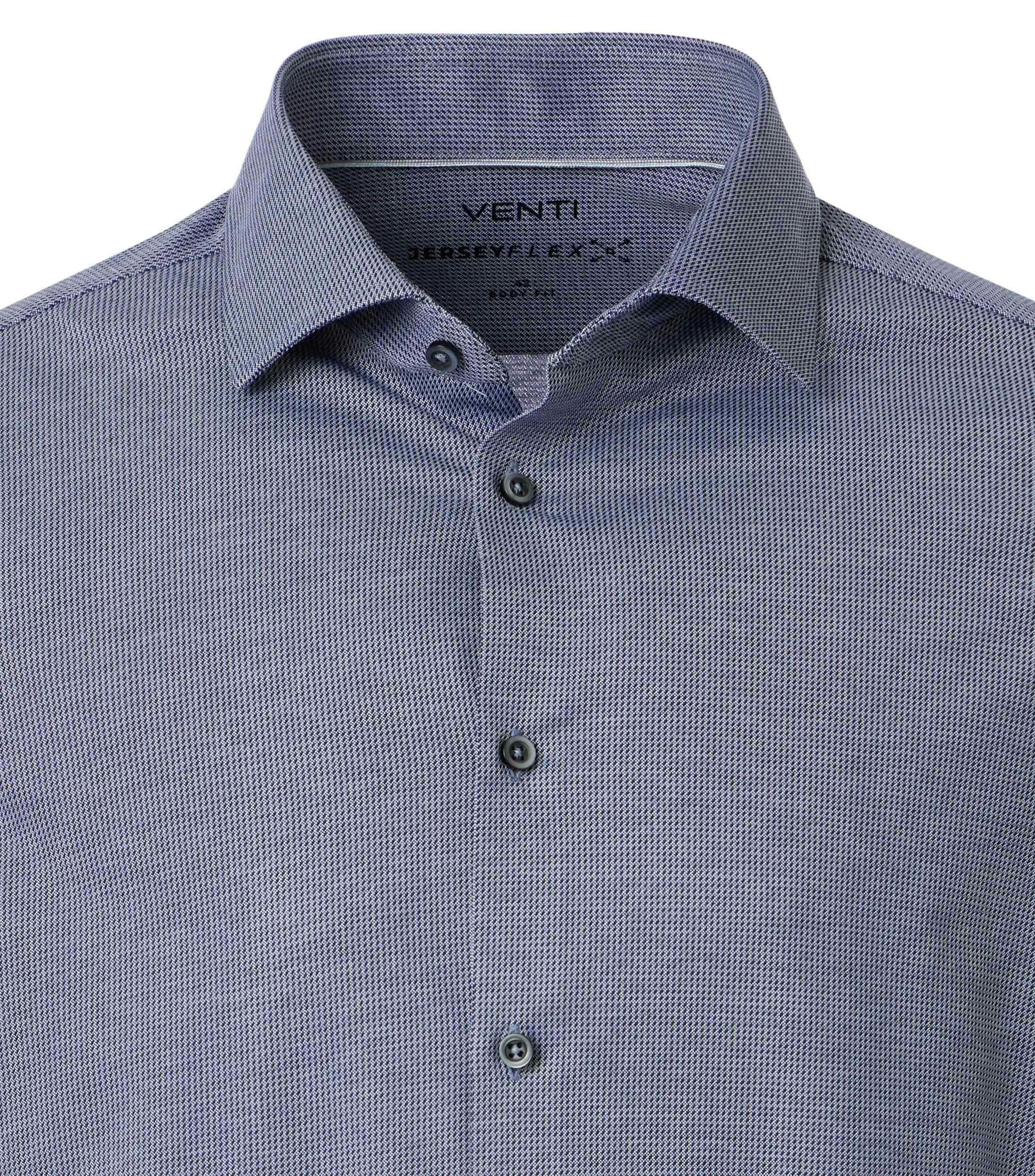 Ein Businesshemd im uni Muster in der Farbe blau