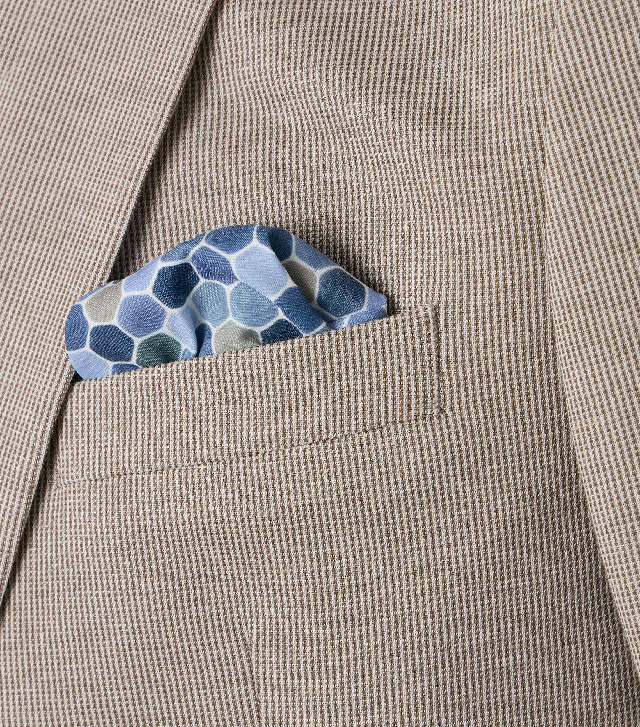 Ein Sakko im uni Muster in der Farbe Beige