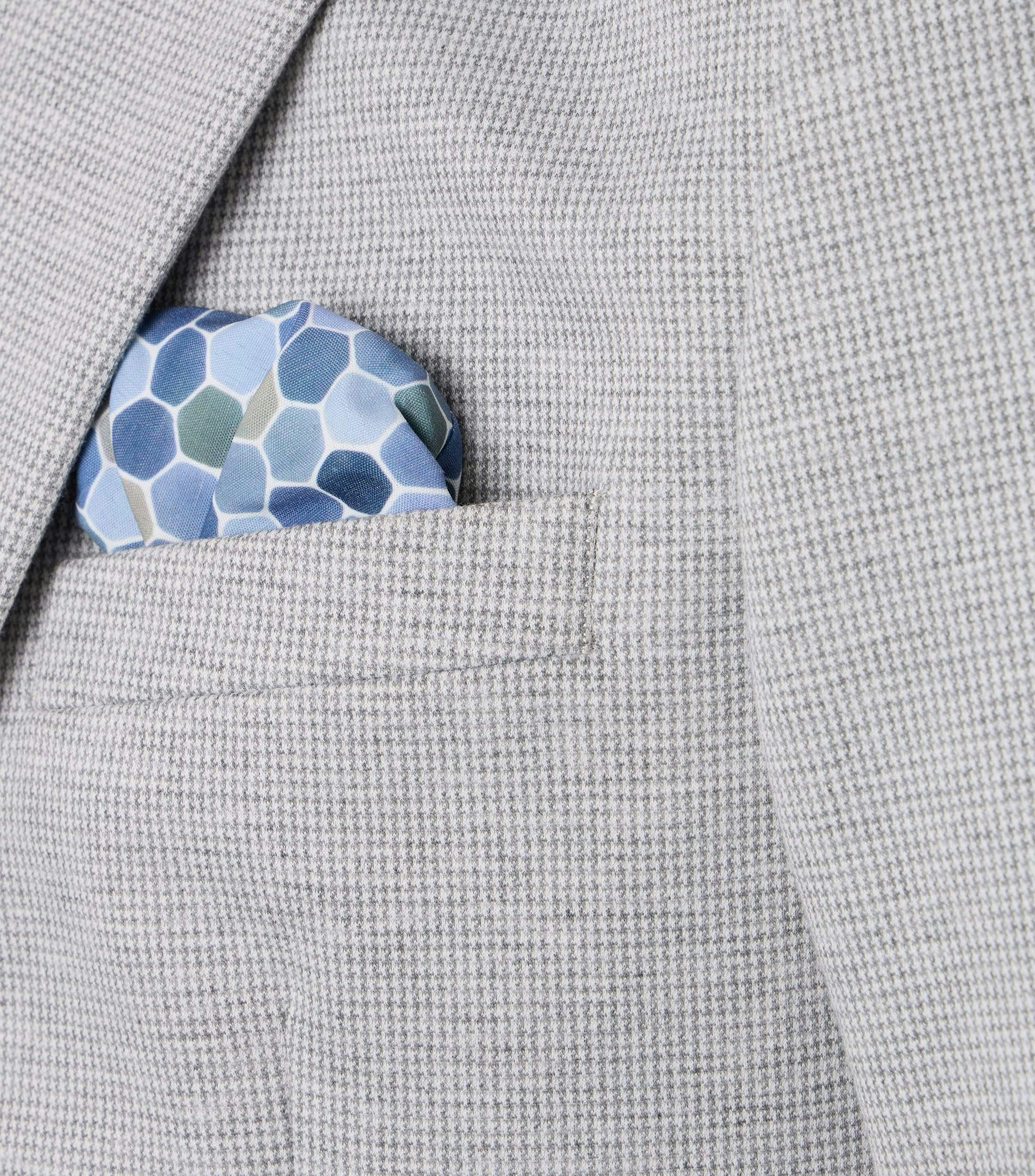 Ein Sakko im uni Muster in der Farbe Hellgrau