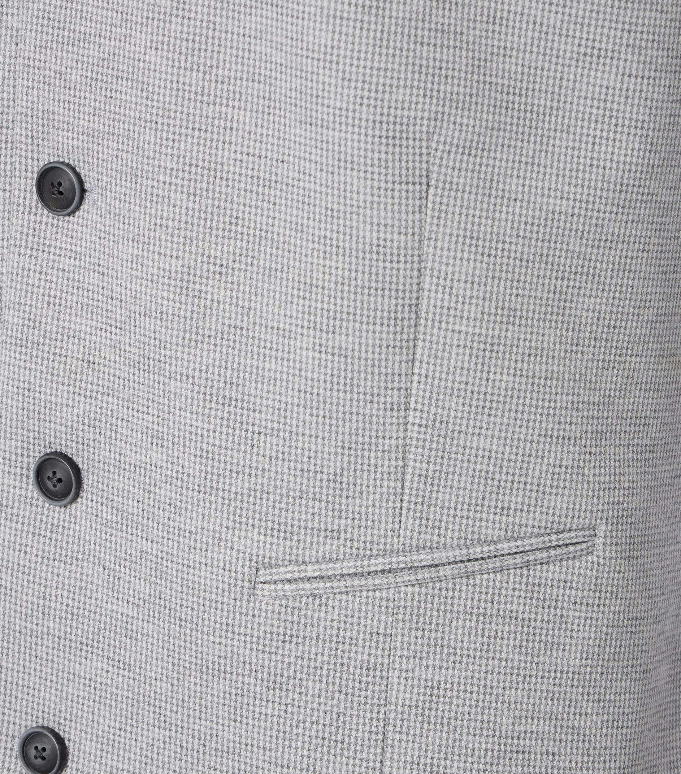 Eine Weste im uni Muster in der Farbe Hellgrau