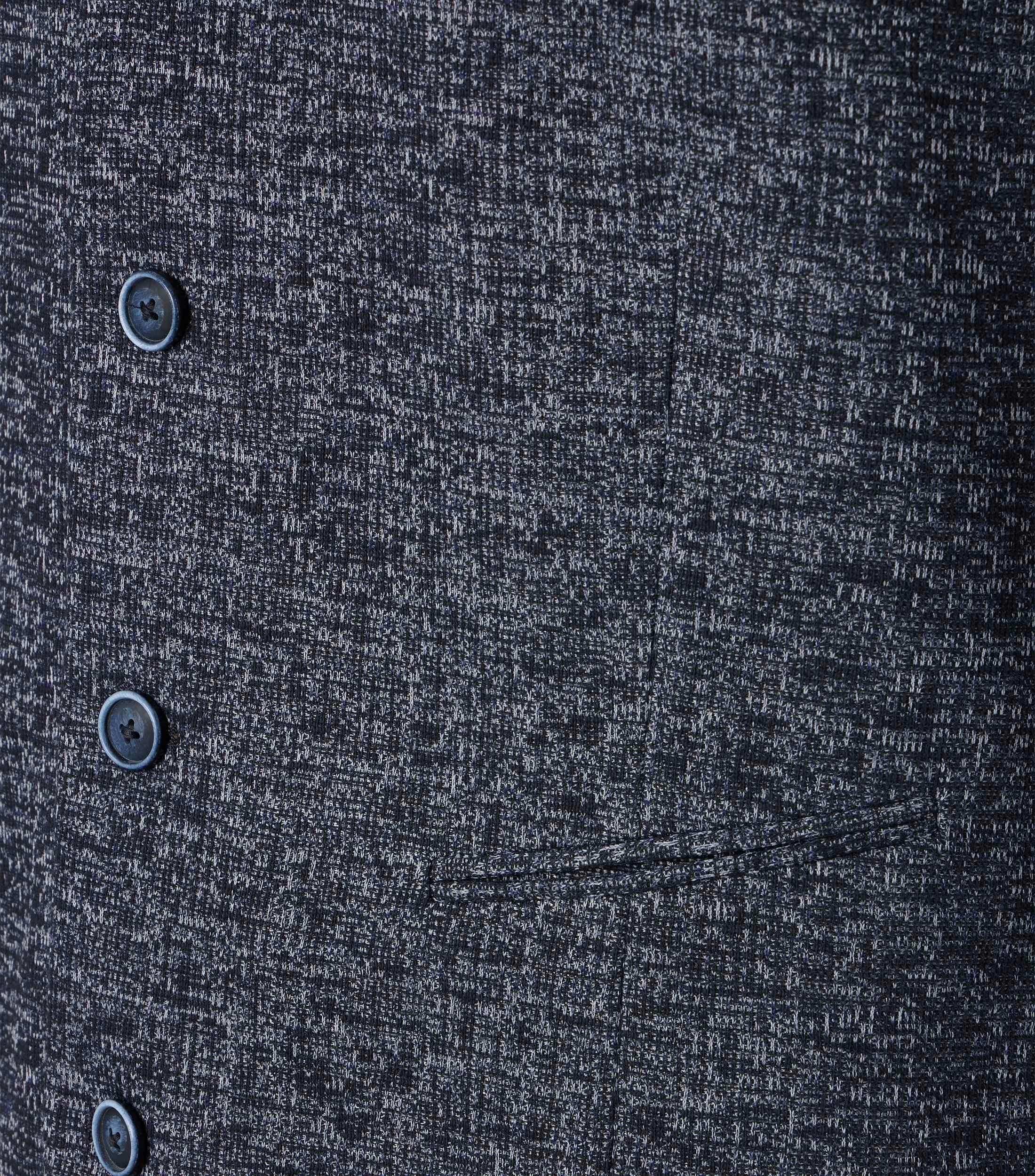 Eine Weste im uni Muster in der Farbe graues Mittelblau