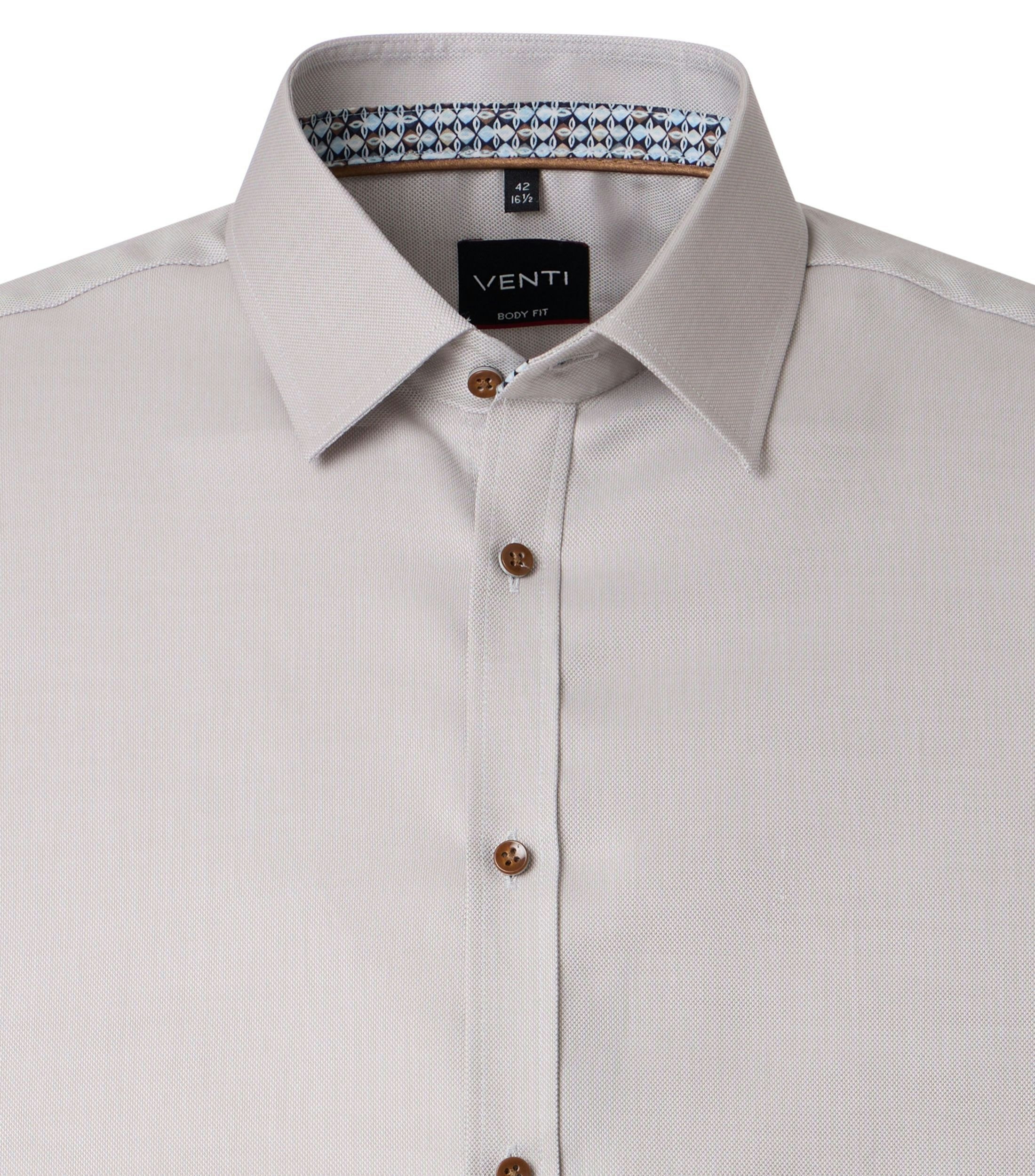 Ein Businesshemd im uni Muster in der Farbe Beige