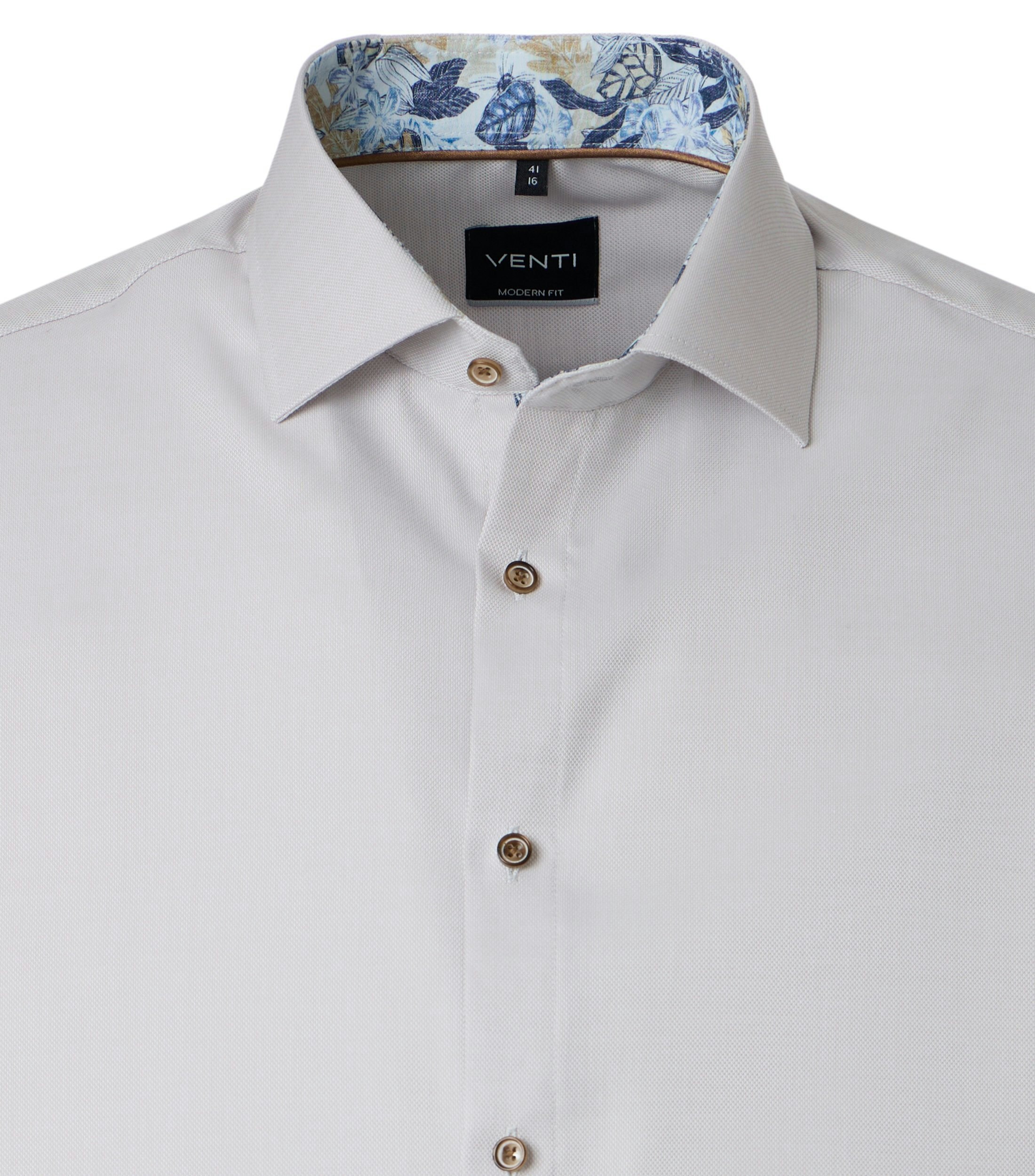 Ein Businesshemd im uni Muster in der Farbe Beige