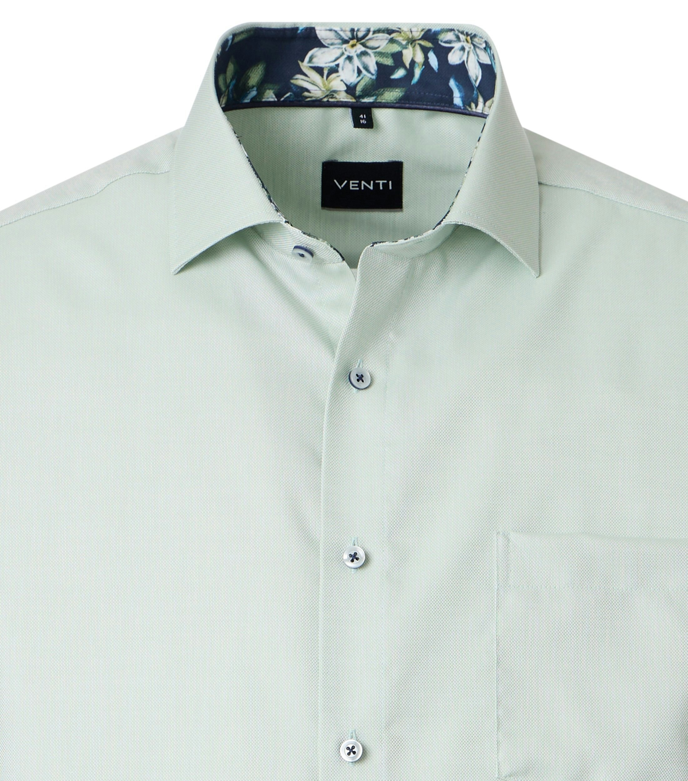 Ein Businesshemd im uni Muster in der Farbe Grün